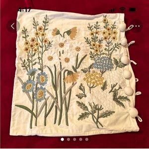 Embroidered standard throw pillow case.
